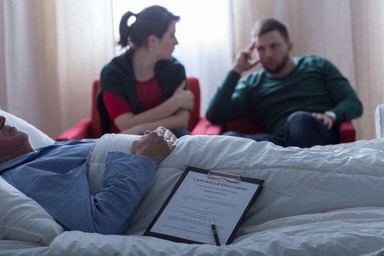 man en vrouw bij bed ouders